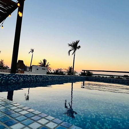 Hotel Mayari Holbox Dış mekan fotoğraf Sunset at the pool