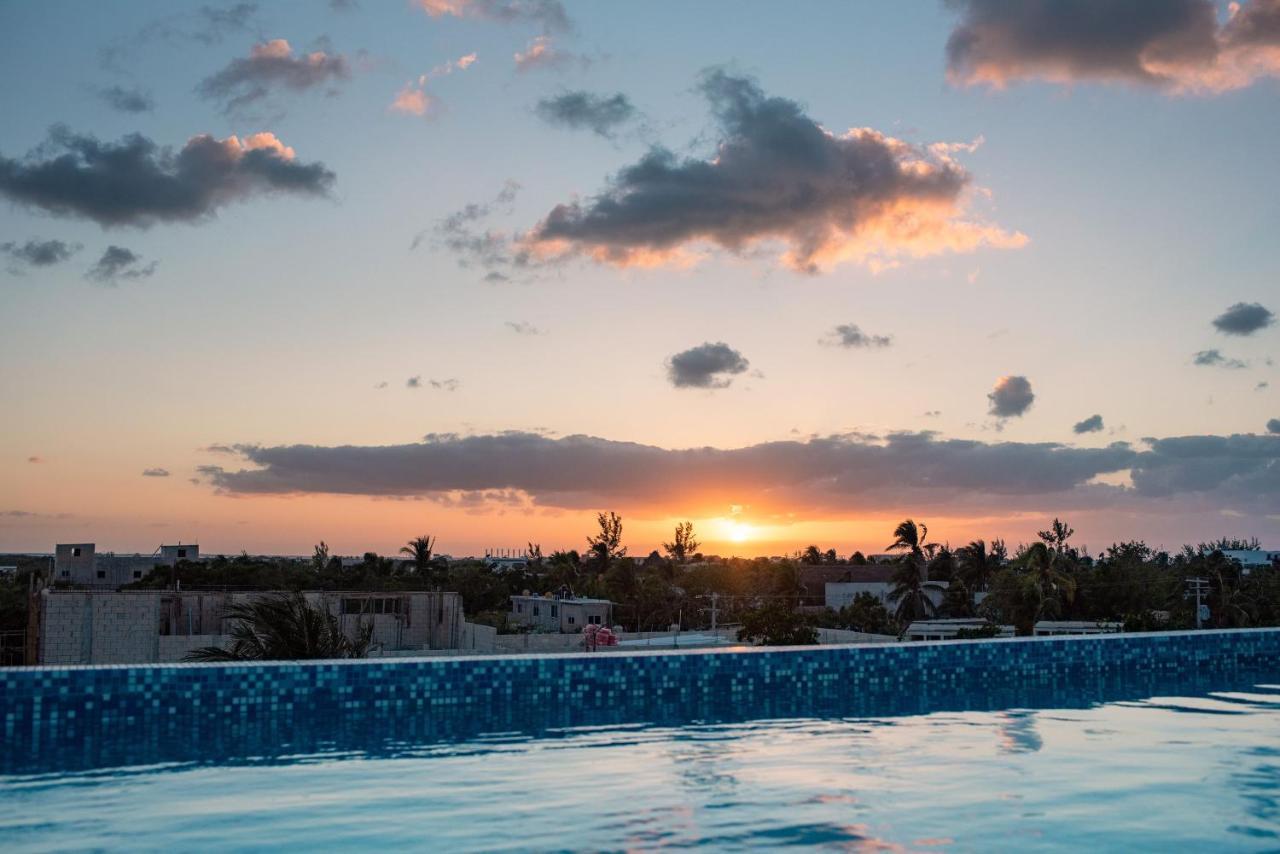 Hotel Mayari Holbox Dış mekan fotoğraf Sunset over Tulum